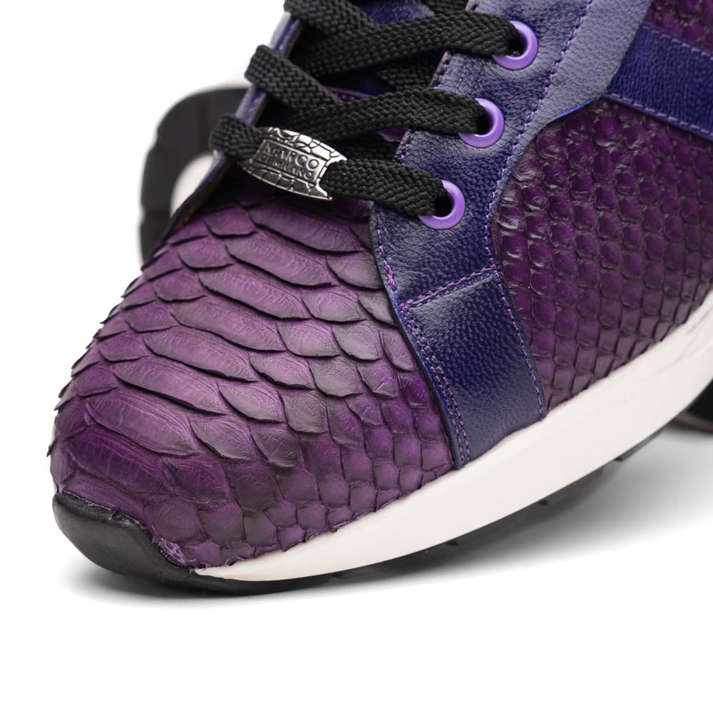 The Verona Purple by Marco Di Milano are hand-painted python sneakers with a textured scale pattern, black laces, and white soles—ideal for elevating any men's sneaker collection. One shoe stands while the other lies on its side.