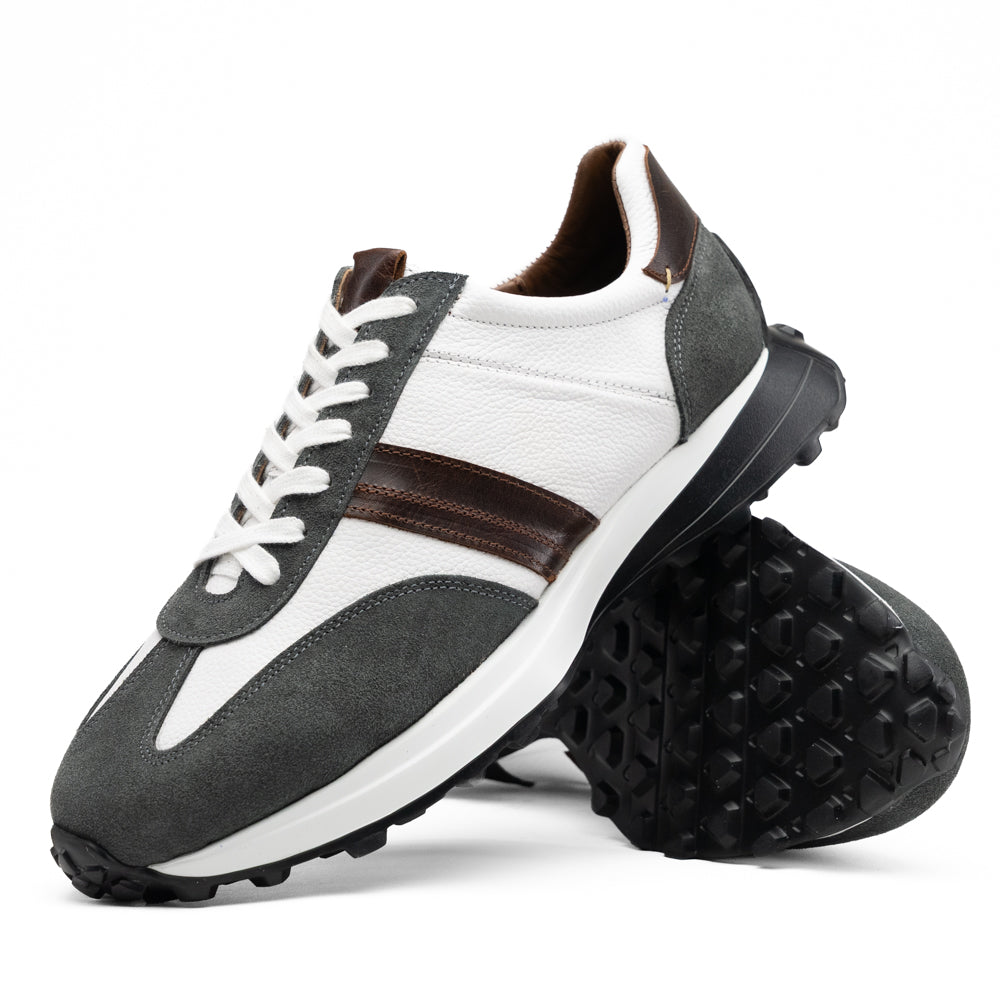 Marco Di Milano Volterra Gray / White retro running sneakers in gray and white suede with brown leather accents, white laces, and a black treaded sole.