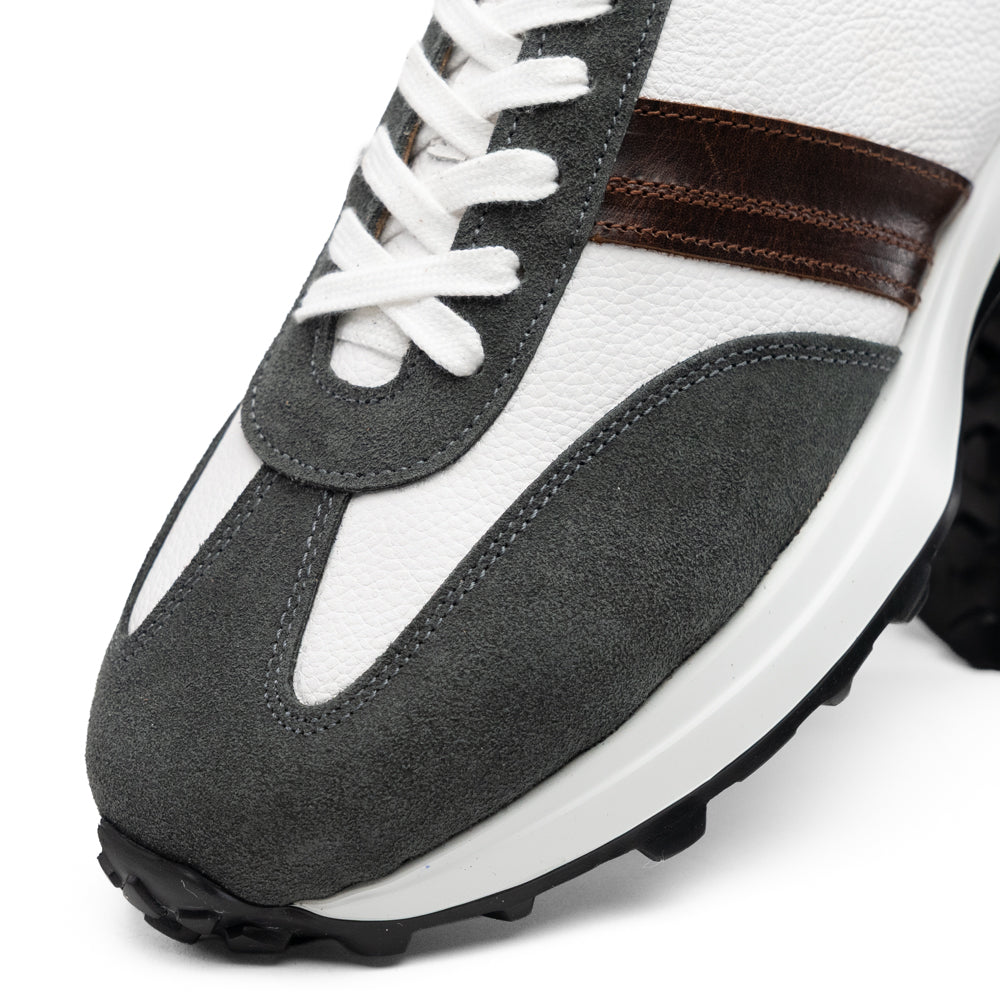 Marco Di Milano Volterra Gray / White suede sneaker in gray and white with brown accents, white laces, and a lugged black rubber sole.