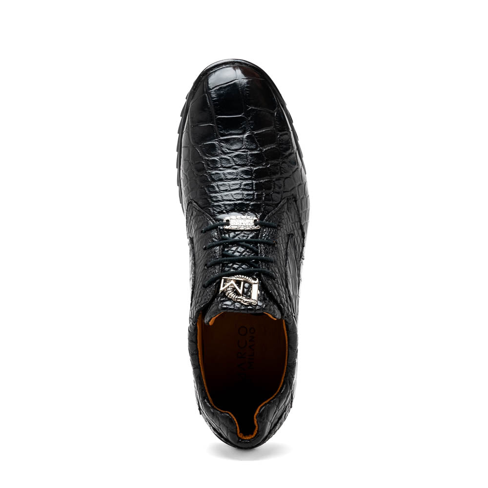 The Vulcan Black by Marco Di Milano are black, crocodile-patterned leather dress shoes with rubber soles—one upright and one displaying the sole. This luxury footwear features hand-painted finishes for a truly refined look.