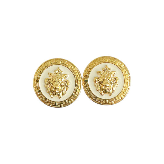 Matiste White/Gold Cufflinks by Matiste feature a raised lion head center with a decorative border, inspired by Italian cufflink elegance.