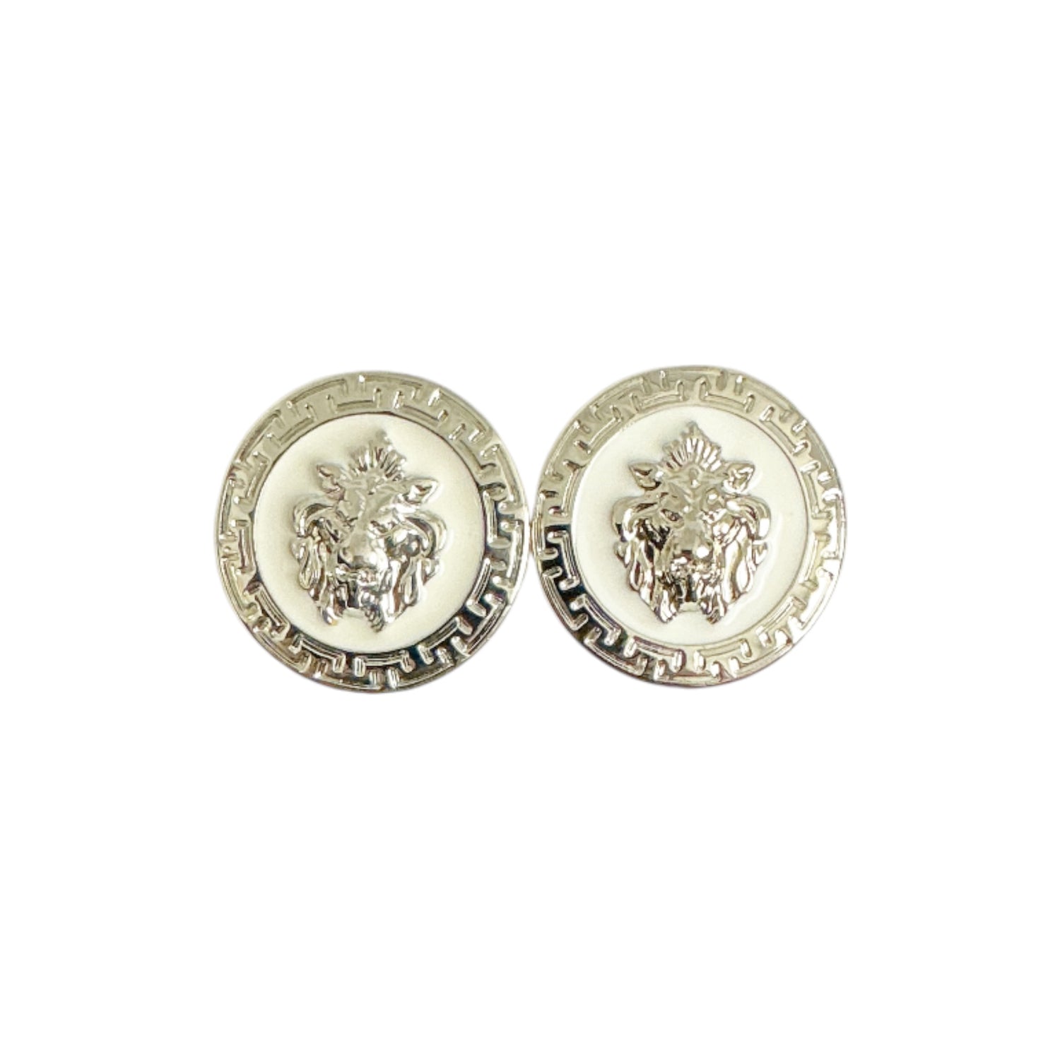 Matiste White/Silver Cufflinks by Matiste feature a round shape with an embossed lion head and a Greek key border in a silver-toned finish.