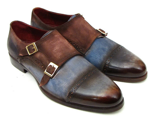 Introducing the Paul Parkman Captoe Double Monkstrap, crafted from Italian calfskin in antique blue and brown suede. This stylish footwear features intricate brogue patterns and double buckles for a distinguished look.