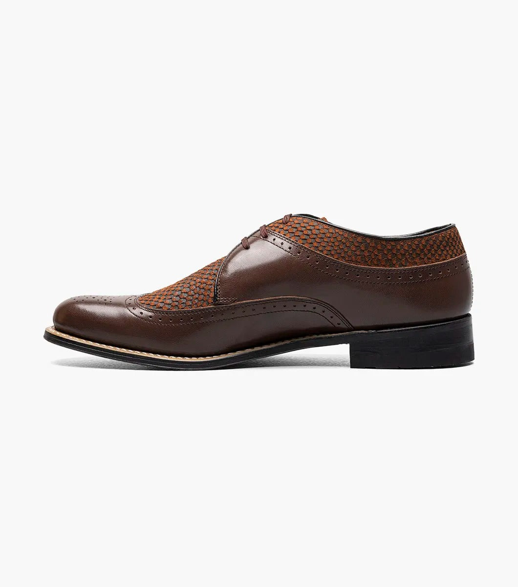 The STACY ADAMS Dayton Python Print Wingtip Oxford in brown features a textured upper, cushioned footbed, lace-up closure, and low heel—model 00626-200—shown against a plain white background.
