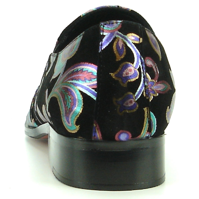 The FI-7133 Black Floral Metal Tip loafer by Fiesso features a metallic pointed toe and low heel, adorned with a vibrant pattern on a black background. This stylish shoe also includes a cushioned insole for enhanced comfort.
