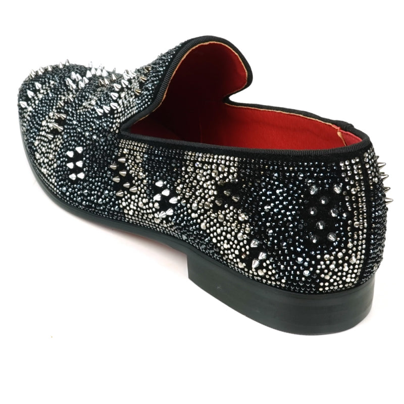 The FI-7516 Black Silver Suede Rhinestones Spikes Slip-On Loafer from Fiesso by Aurelio Garcia features a white polka dot pattern and small rhinestone spikes, complemented by a striking red interior lining. Ideal for those looking for high-fashion men's dress shoes with a unique twist.