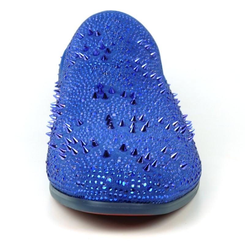 The FI-7516 Blue Suede Rhinestones Spikes Slip On Loafer from Fiesso by Aurelio Garcia effortlessly blends elegance with an edgy touch. Featuring blue rhinestone spikes and a bold red interior lining, this standout shoe is an ideal addition to any men's dress wardrobe, offering a unique flair that perfectly complements your style.