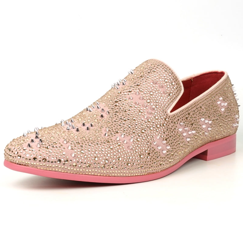 The FI-7516 Pink Suede Rhinestones Spikes Slip on Loafer by Fiesso is a remarkable design, embellished with dazzling rhinestones and spikes. It has a low heel and a sumptuous red interior, ideal for those who enjoy making bold fashion statements.