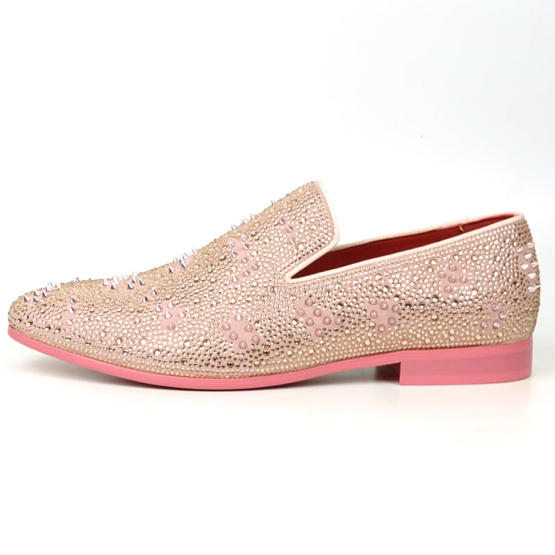 The FI-7516 Pink Suede Rhinestones Spikes Slip on Loafer Fiesso by Aurelio Garcia is a single pink suede loafer embellished with sparkling rhinestones and small spikes, and it features a red interior and sole.