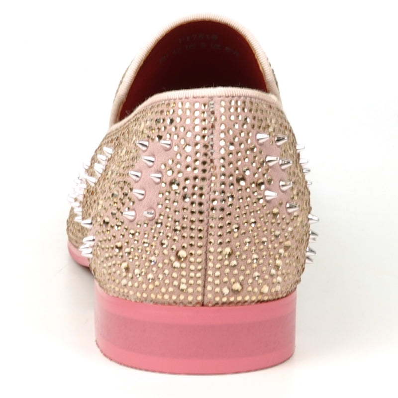 The FI-7516 Pink Suede Rhinestones Spikes Slip on Loafer by Fiesso is a remarkable design, embellished with dazzling rhinestones and spikes. It has a low heel and a sumptuous red interior, ideal for those who enjoy making bold fashion statements.