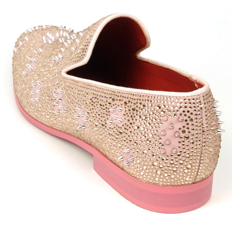 The FI-7516 Pink Suede Rhinestones Spikes Slip on Loafer by Fiesso is a remarkable design, embellished with dazzling rhinestones and spikes. It has a low heel and a sumptuous red interior, ideal for those who enjoy making bold fashion statements.