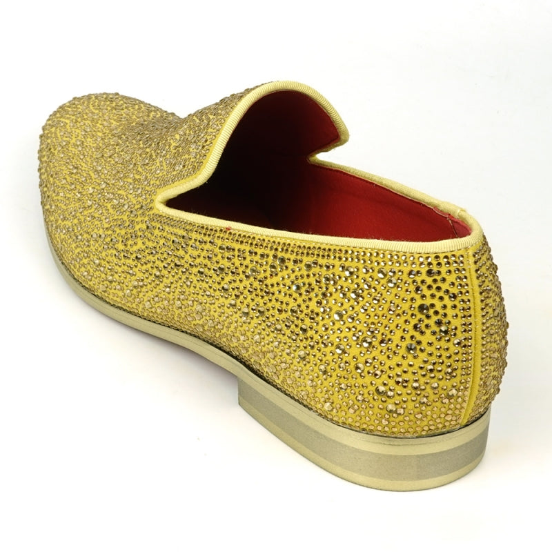 The FI-7525 Gold Suede Slip-on Loafer by Fiesso is a dazzling masterpiece, adorned with gold rhinestones and featuring a bold red interior lining.