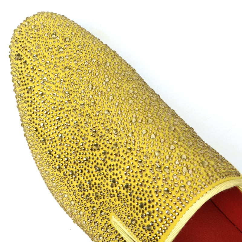 The FI-7525 Gold Suede Slip-on Loafer by Fiesso is a dazzling masterpiece, adorned with gold rhinestones and featuring a bold red interior lining.