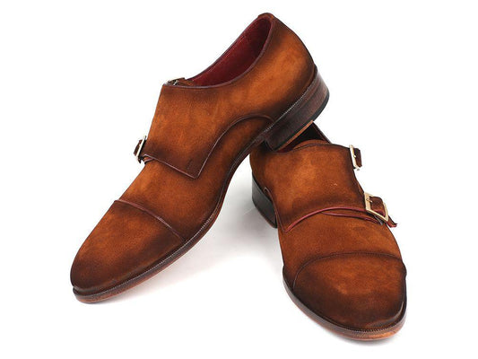 The Paul Parkman Captoe Double Monkstrap Camel Suede - 045TAB12 shoes by Paul Parkman are a pair of handcrafted suede double monk strap shoes with silver buckles, featuring a cap toe design and red interior lining.
