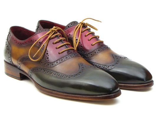 Paul Parkman Three Tone Wingtip Oxfords - PP22F75 by Paul Parkman are multicolored leather brogue shoes with brown laces and intricate detailing, showcasing shades of red, brown, and dark green.
