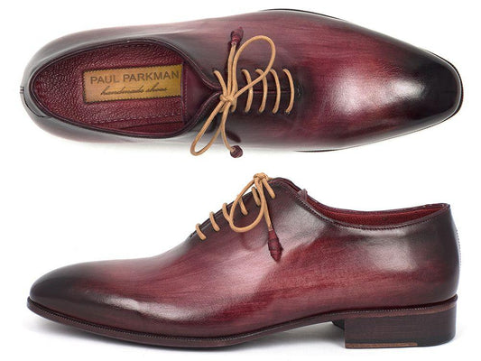Crafted with couture-level precision, the Paul Parkman Burgundy Wholecut Plain Toe Oxfords - DS65BUR are handmade from exquisite hand-painted calfskin leather. These oxford shoes feature stylish brown laces and showcase elegance from both top and side views.