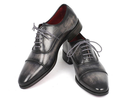 Men's handmade captoe oxfords by Paul Parkman in gray and black, featuring a polished finish, red interior, and exquisite hand-painted details.