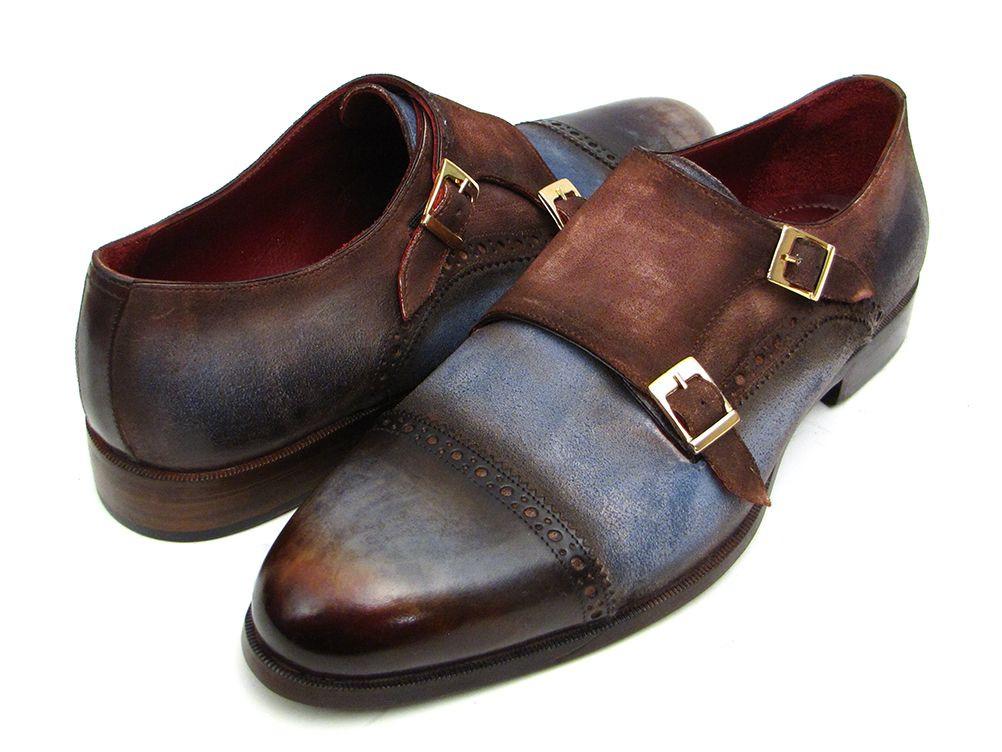 Introducing the Paul Parkman Captoe Double Monkstrap, crafted from Italian calfskin in antique blue and brown suede. This stylish footwear features intricate brogue patterns and double buckles for a distinguished look.