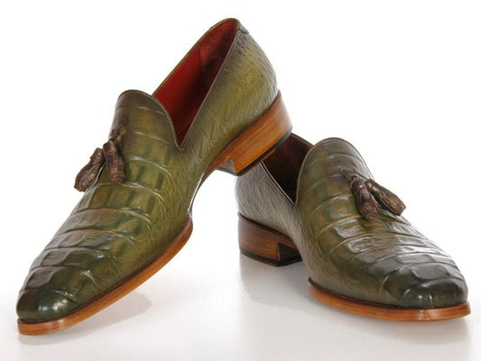 The Paul Parkman Green Crocodile Embossed Calfskin Tassel Loafer - PP2281-GREEN showcases its refined tassels and wooden heels against a pristine white background, embodying elegant craftsmanship.