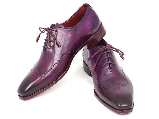 Paul Parkman Purple Wingtip Oxfords - 84HT12 are exquisitely crafted handmade dress shoes in a shiny purple leather with decorative perforations and red laces, designed in a classic wingtip Oxford style.