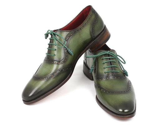 Introducing the Paul Parkman Green Calfskin Oxfords - K78-GRN by Paul Parkman, these handcrafted men's shoes feature darker green shades, decorative perforations, and matching green laces to provide a perfect blend of style and elegance.