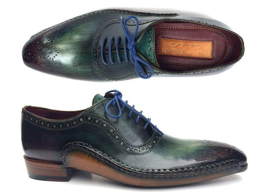 Introducing the Paul Parkman Green & Purple Handmade Oxfords - OPK215C by Paul Parkman, featuring a pair of handmade leather dress shoes with blue laces. These shoes boast an intricate brogue design and a distinctive color transition from green to brown, enhanced by a hand-painted finish.