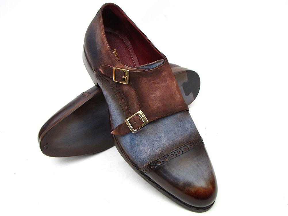 Introducing the Paul Parkman Captoe Double Monkstrap, crafted from Italian calfskin in antique blue and brown suede. This stylish footwear features intricate brogue patterns and double buckles for a distinguished look.