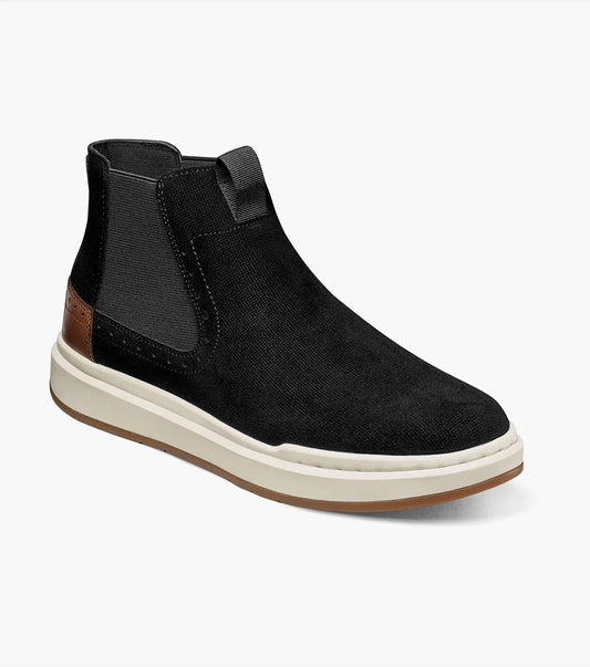 The Stacy Adams Cooper Plain Toe Chelsea Boot in black suede features a white rubber sole, brown heel accent, elastic side panels, and pull tab. Style: 25483-008.