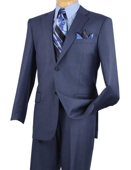 The Regular Fit 2 Piece 2 Button Textured Weave Suit (Blue) by Vinci Suits, combined with a light blue shirt, striped tie, and flat front pants on a mannequin, creates a polished look that exudes confidence.