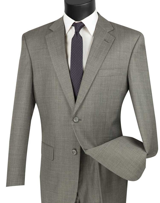 On display is the Vinci Suits Regular Fit 2 Piece 2 Button Textured Weave Suit in gray, featuring a white shirt and dark tie. Its timeless elegance comes from regular fit tailoring and flat front pants that maintain a sleek silhouette.