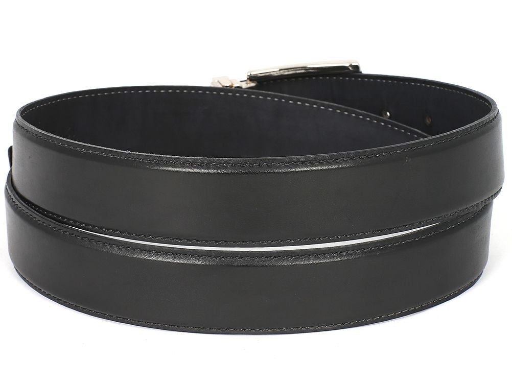The Paul Parkman Leather Belt Hand-Painted Black - B01-BLK, by Paul Parkman, is crafted from premium calfskin leather and showcases a sleek black design with a silver buckle and two visible holes.
