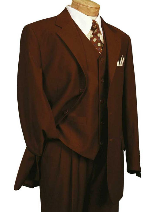 Displayed on a mannequin, the Vinci Suits Regular Fit 3 Piece Single Breasted Suit in Cognac (3TR-3) includes a jacket, vest, and pleated pants. Paired with a patterned tie and crisp white shirt, it exudes timeless elegance.