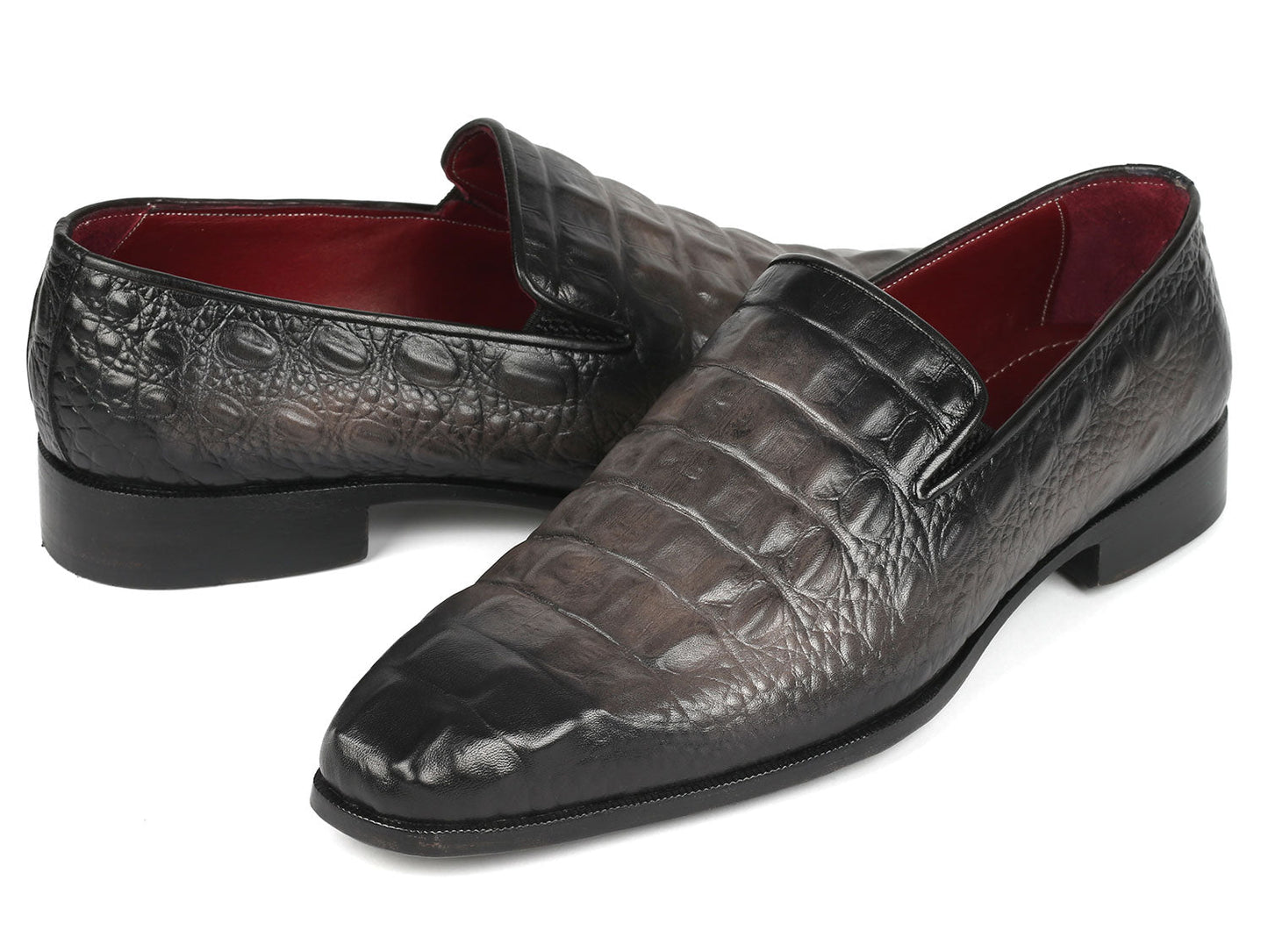A pair of Paul Parkman Gray Crocodile Embossed Calfskin Loafers, these crafted beauties are perfect for those who appreciate the finer details.