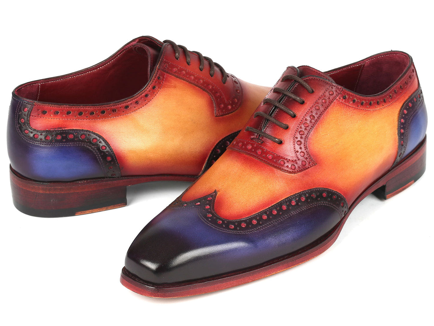 The Paul Parkman Goodyear Welted Men's Wingtip Oxfords Multicolor - 6819-MLT feature a handcrafted design with ombre colors of red, orange, and purple, wingtip oxford brogue detailing, and black laces.