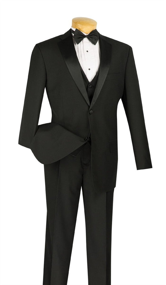 Mannequin dressed in Vinci Suits' Regular Fit 4 Piece Tuxedo with Vest Bow Tie in Black, style 4TV-1, featuring a wrinkle-resistant design with a bow tie and white dress shirt.