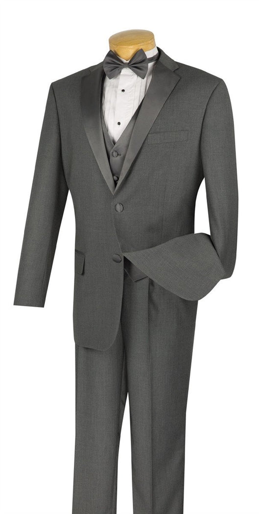The mannequin is elegantly adorned with the Vinci Suits Regular Fit 4 Piece Tuxedo with Vest Bow Tie (Gray), featuring black satin lapels and paired with a crisp white shirt and sleek black bow tie.