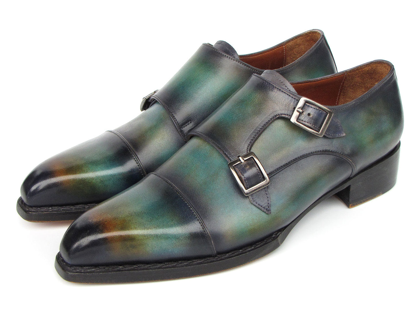 Introducing the Paul Parkman Men's Cap Toe Double Monkstrap Shoes in Green & Blue Patina (model 2598-5BG), these exquisite shoes are crafted from hand-painted leather, showcasing a striking gradient of green and blue hues. As a made-to-order product, they promise both unique style and perfect fit.