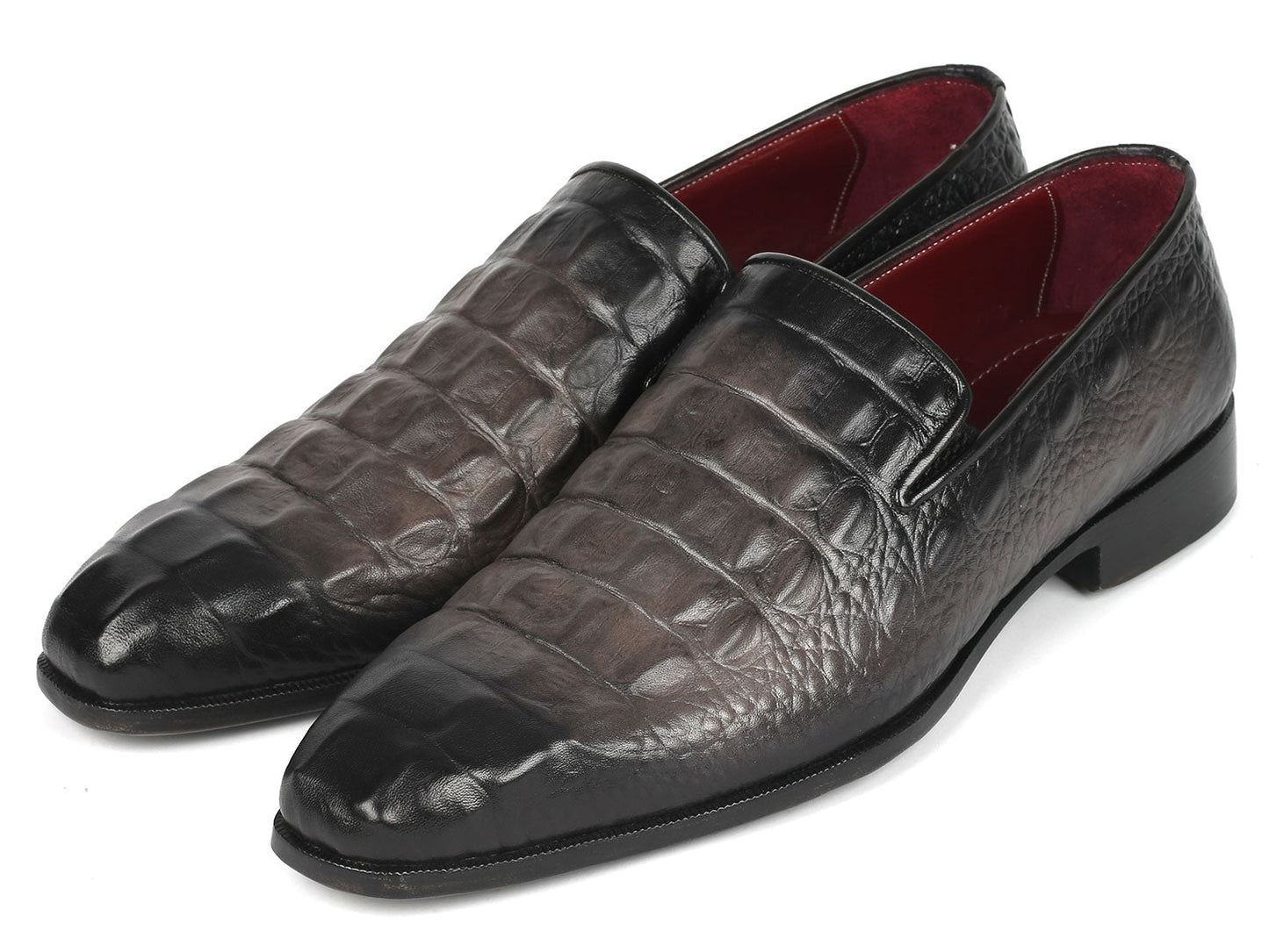 A pair of Paul Parkman Gray Crocodile Embossed Calfskin Loafers, these crafted beauties are perfect for those who appreciate the finer details.