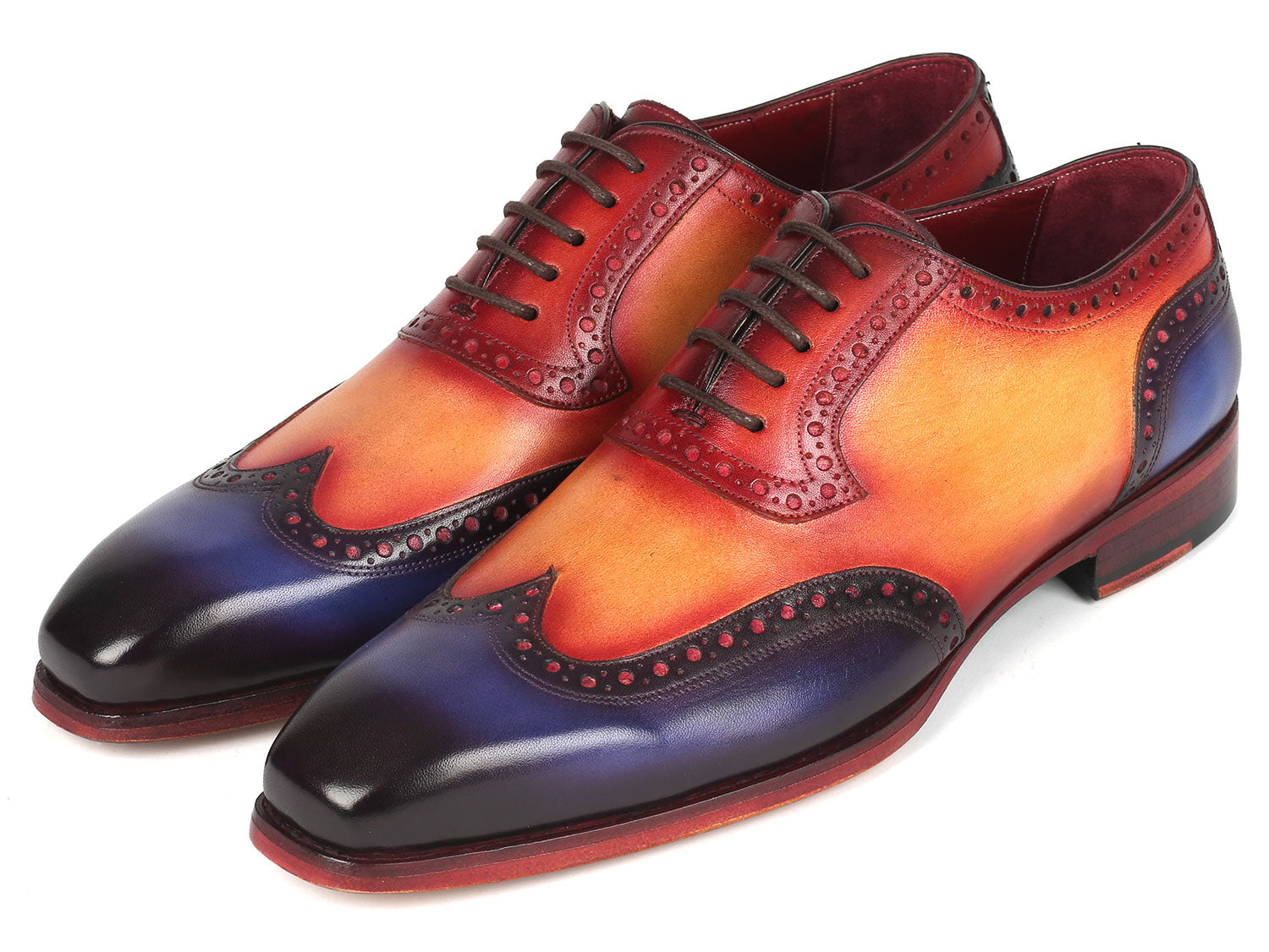 The Paul Parkman Goodyear Welted Men's Wingtip Oxfords Multicolor - 6819-MLT feature a handcrafted design with ombre colors of red, orange, and purple, wingtip oxford brogue detailing, and black laces.