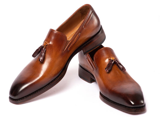 The Paul Parkman Brown Goodyear Welted Tassel Loafers - 51TS-BRW feature a polished finish and stacked heel, meticulously crafted from hand-painted leather for a distinctive touch.
