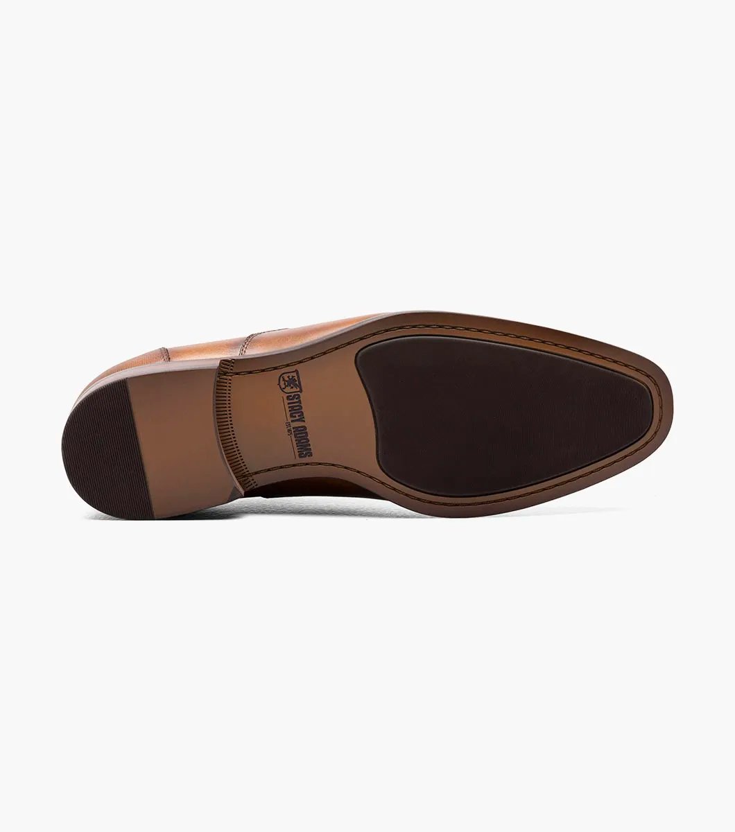 The STACY ADAMS Kallum Cap Toe Oxford in Cognac (25568-221) is a brown men's dress shoe with a cushioned footbed and dark laces, shown on a white background.