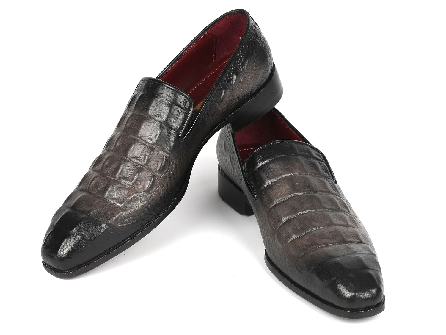 A pair of Paul Parkman Gray Crocodile Embossed Calfskin Loafers, these crafted beauties are perfect for those who appreciate the finer details.
