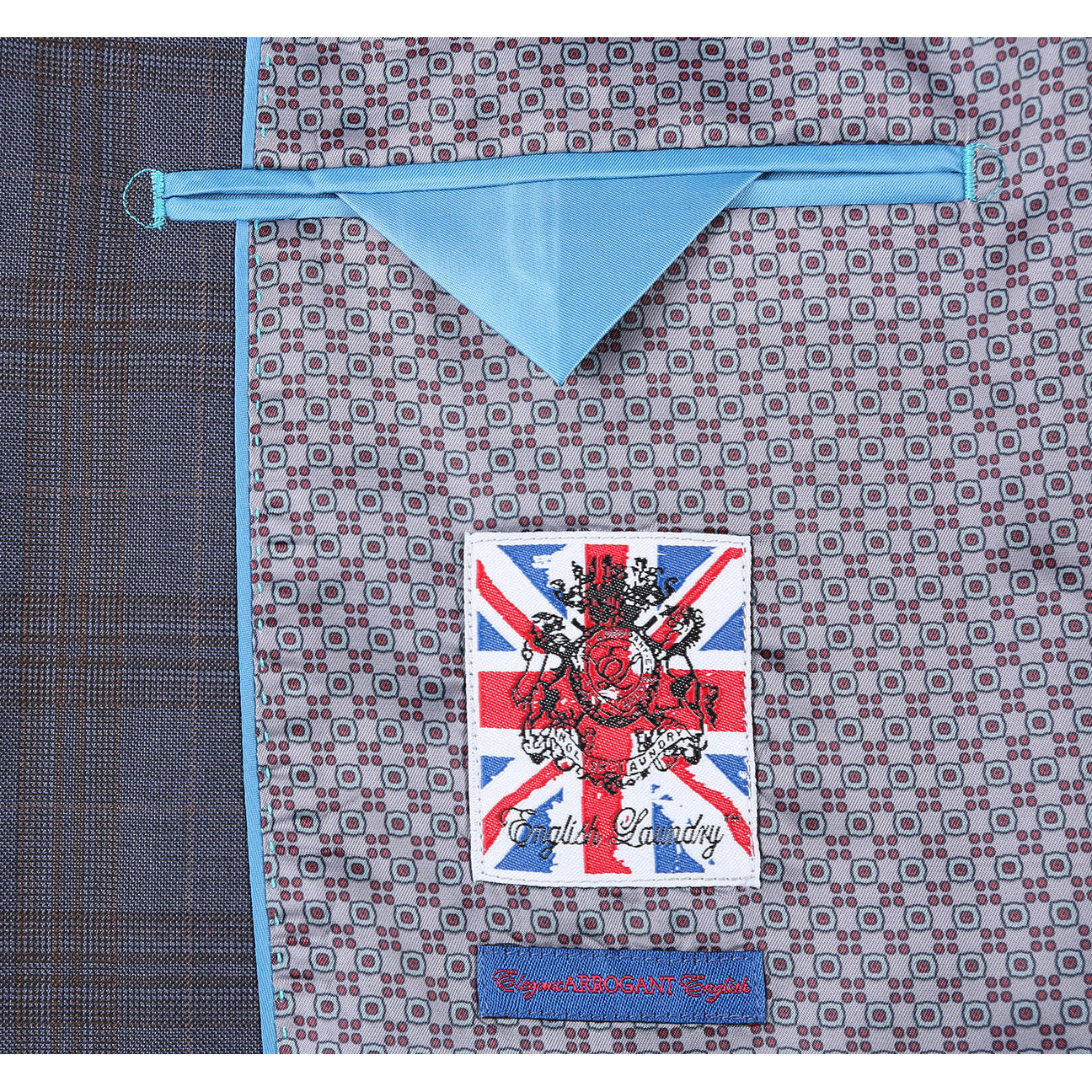 Displayed on a white background, the ENGLISH LAUNDRY Gray with Tan Check Notch Suit 72-55-555 from English Laundry's men's stylish suit collection boasts a two-button closure and side pockets, combining classic style with modern functionality.