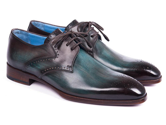 Paul Parkman presents the Turquoise & Brown Medallion Toe Derby Shoes, featuring a pair of dark green hand-painted leather dress shoes with laces, decorative perforations, wooden soles, and blue interior lining.