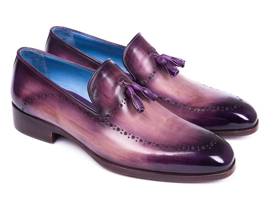 The Paul Parkman Tassel Loafer Purple - 66T80-PRP is a remarkable custom-made men's shoe featuring a striking glossy purple hue, meticulously crafted from hand-painted leather and enhanced with intricate decorative perforations, beautifully highlighted against a clean white background.
