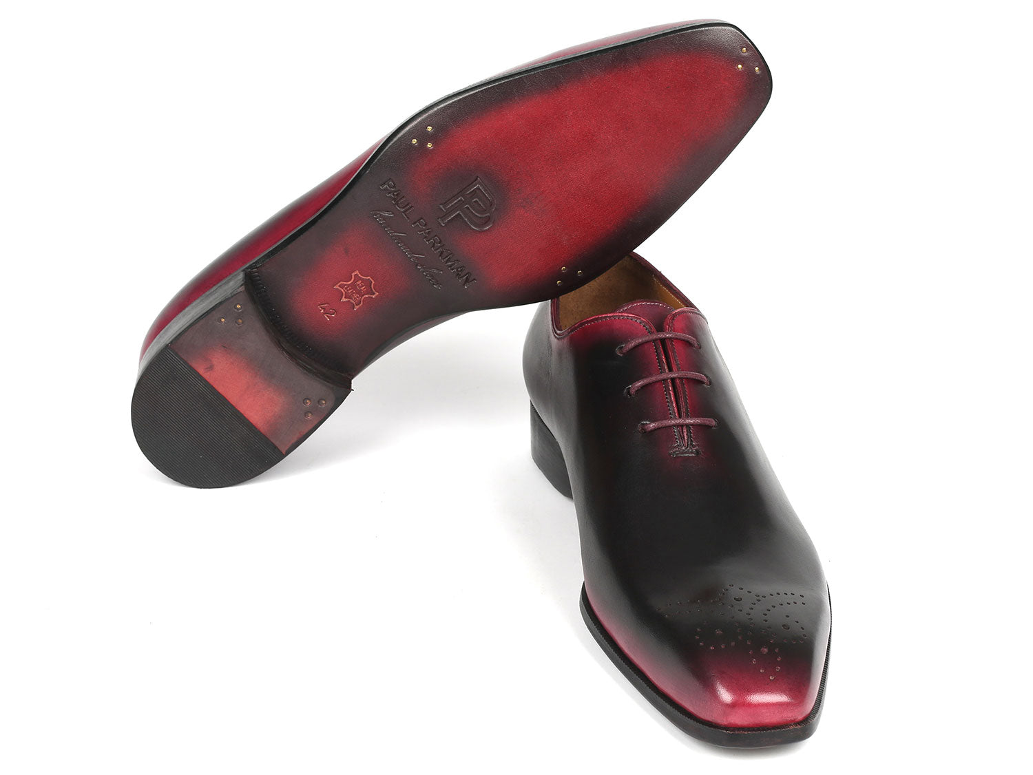 A pair of Paul Parkman Black & Red Men's Oxford Shoes (Model: KR254-01-83), handcrafted with polished black and burgundy leather featuring hand-painted details and intricate brogue work, elegantly stacked on a white background.