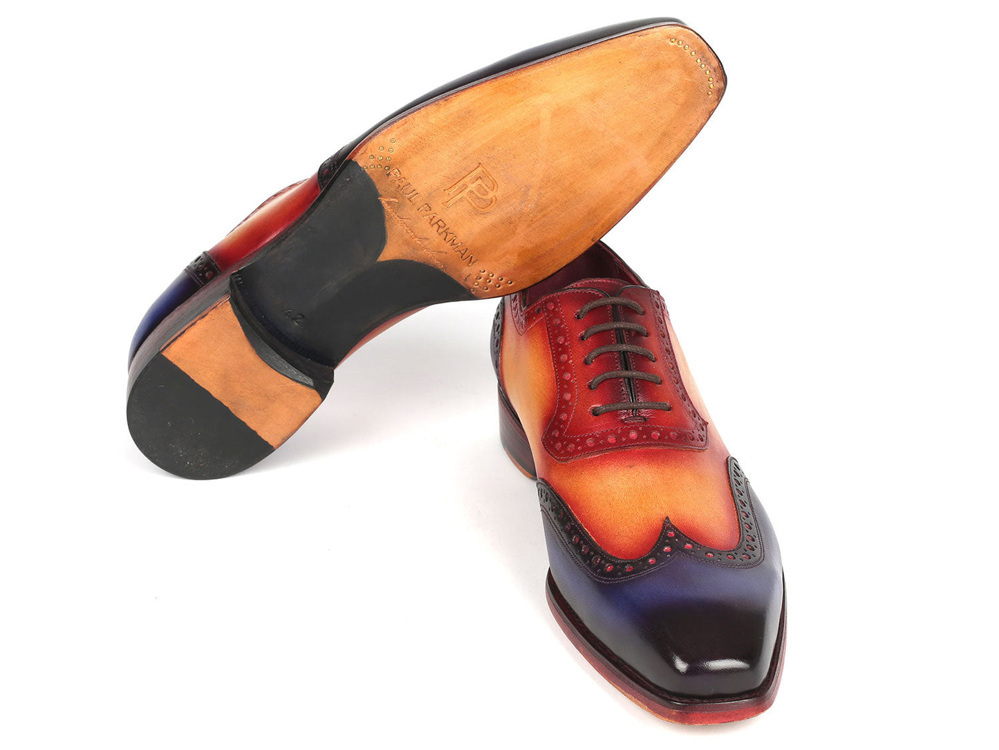 Introducing the Paul Parkman Goodyear Welted Men's Wingtip Oxfords Multicolor - 6819-MLT, a striking pair of vibrant, multicolored shoes with a lace-up design and exquisite hand-painted leather detailing in shades of red, orange, and blue.
