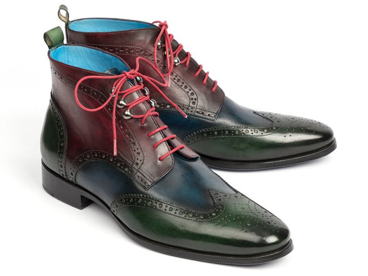 Introducing the Paul Parkman Wingtip Ankle Boots Three Tone Green Blue Bordeaux - 777-GRN-BLU by Paul Parkman. These stylish hand-painted leather ankle boots showcase a vibrant green, blue, and bordeaux gradient design. They are accentuated with pink laces and feature decorative perforations in an elegant three-tone wingtip style, exuding flair and personality.