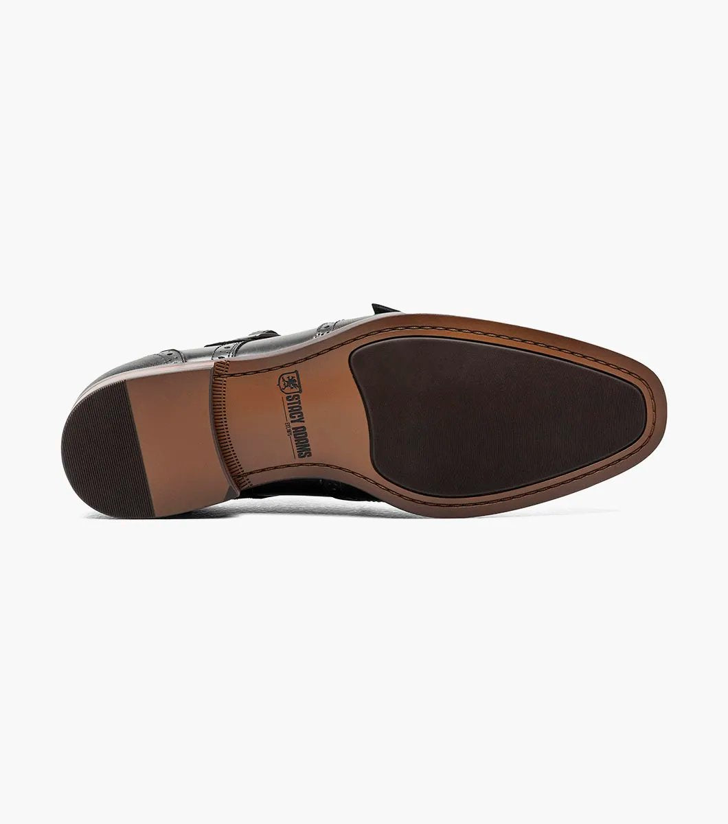 The Stacy Adams KARSON Wingtip Double Monk Strap - Black (model 25570-001) showcases a sophisticated black leather dress shoe with brogue detailing, set against a white background, crafted from premium leather.