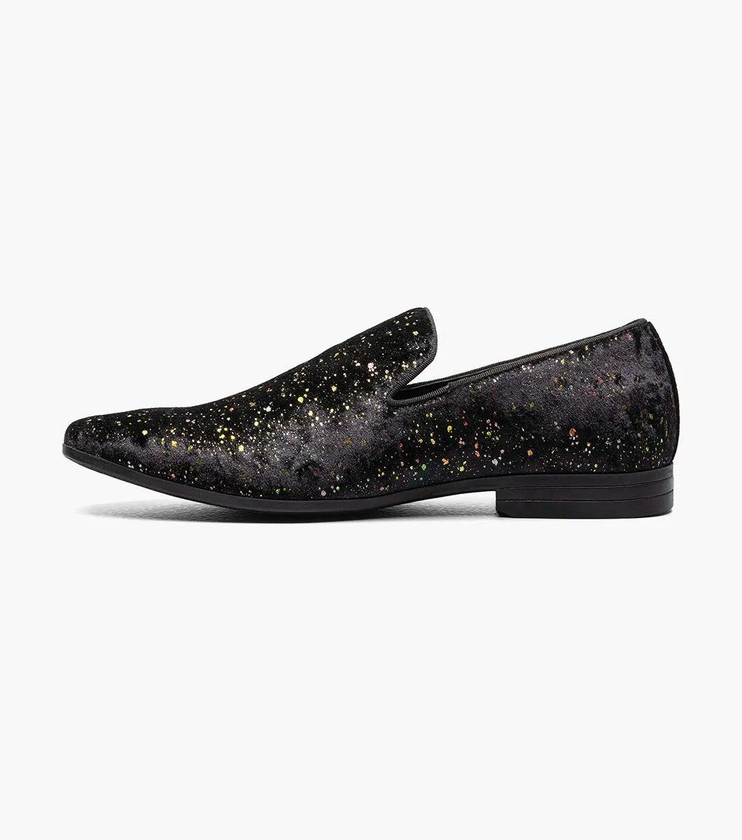 Introducing the Stacy Adams Stellar - STELLAR Plain Toe Glitter Slip On in Black (25534-001). This shoe features a unique multicolored speckled pattern that evokes the beauty of stars. Experience exceptional comfort with its memory foam footbed, ensuring each step feels as if you're walking on clouds.
